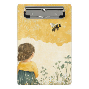 Little Girl Watching a Bumblebee Mini Clipboard