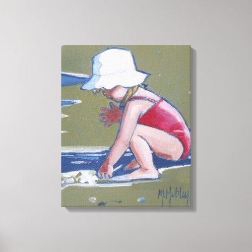 Little girl with hat on beach with waves canvas print