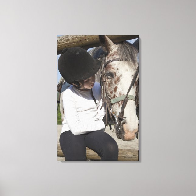 Little girl with her horse canvas print (Front)