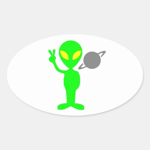 Little Green Alien Next to the Planet Saturn Oval Sticker