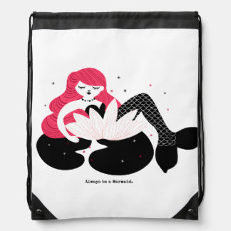 Little Mermaid resting in a Flower Drawstring Bag