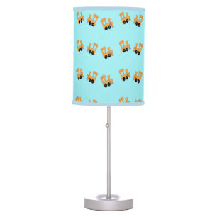Little orange trains pattern on blue table lamp
