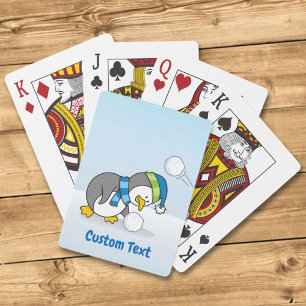 Little penguin getting a snow ball bicycle playing poker cards
