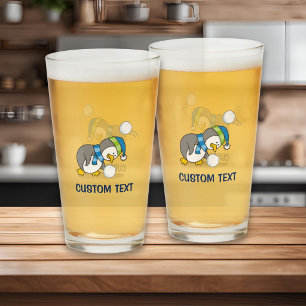 Little penguin getting a snow ball glass