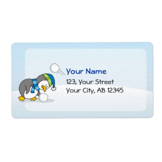 Little penguin getting a snow ball label