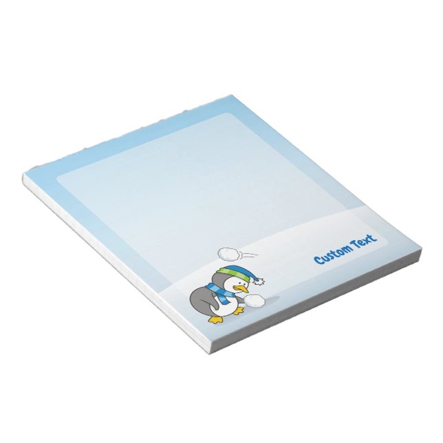 Little penguin getting a snow ball notepad (Angled)