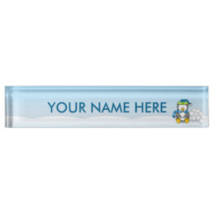 Little penguin sitting with snowballs desk name plate
