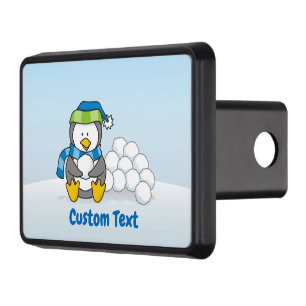 Little penguin sitting with snowballs hitch cover