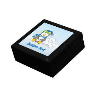 Little penguin sitting with snowballs keepsake box
