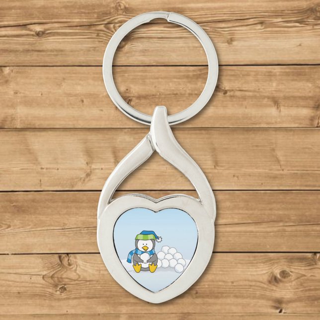 Little penguin sitting with snowballs keychain (Creator Uploaded)