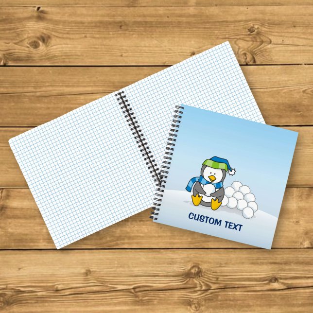 Little penguin sitting with snowballs notebook (Creator Uploaded)