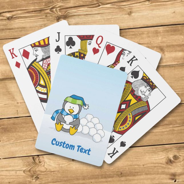 Little penguin sitting with snowballs playing card (Creator Uploaded)