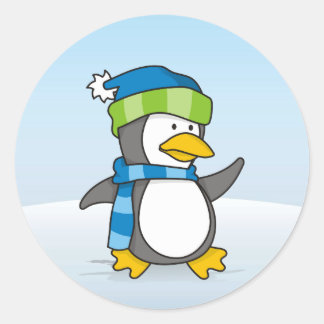 Little penguin walking on snow classic round sticker