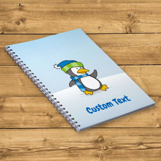 Little penguin walking on snow notebook