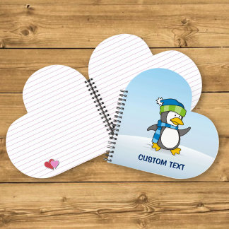 Little penguin walking on snow notebook
