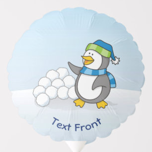 Little penguin with snow balls waving balloon