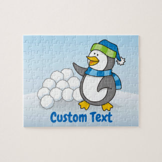 Little penguin with snow balls waving jigsaw puzzle