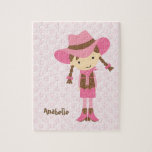 Little Pink Cowgirl Jigsaw Puzzle<br><div class="desc">Custom jigsaw puzzle features a beautiful vector illustration of a little cowgirl on a pink horseshoes pattern background. 
 Personalize with your little girl's name,  monogram,  initials,  or text of your choice for a one of a kind gift. 
 Cocoa Studio.</div>
