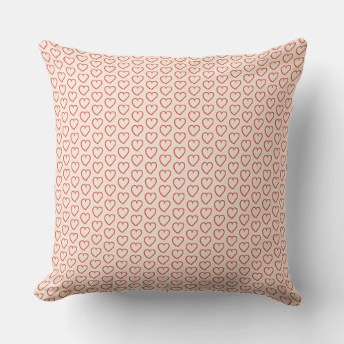 Little red hearts on pastel pink throw pillow