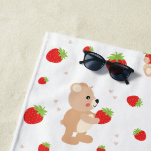 Little teddy bear with strawberry beach towel