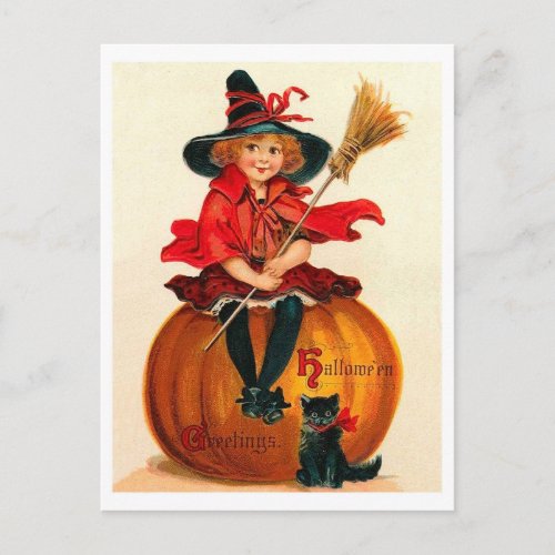 Little witch sitting on a big pumpkin vintage postcard