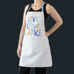 Live Love Latke Hanukkah Design Apron<br><div class="desc">Celebrate the joy of Hanukkah with this colorful "Live Love Latke" design. Featuring bright colors and playful typography,  this graphic is perfect for a variety of products,  from home decor to gifts. Add a touch of holiday spirit and deliciousness to your space with this fun and festive design.</div>