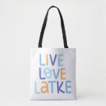 Live Love Latke Hanukkah Design Tote Bag<br><div class="desc">Celebrate the joy of Hanukkah with this colorful "Live Love Latke" design. Featuring bright colors and playful typography,  this graphic is perfect for a variety of products,  from home decor to gifts. Add a touch of holiday spirit and deliciousness to your space with this fun and festive design.</div>