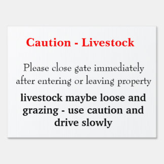 Livestock caution sign for driveway gate
