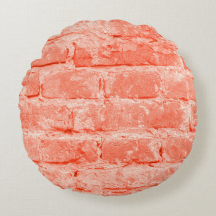 Living Coral. Brick wall background. Closeup horiz Round Pillow