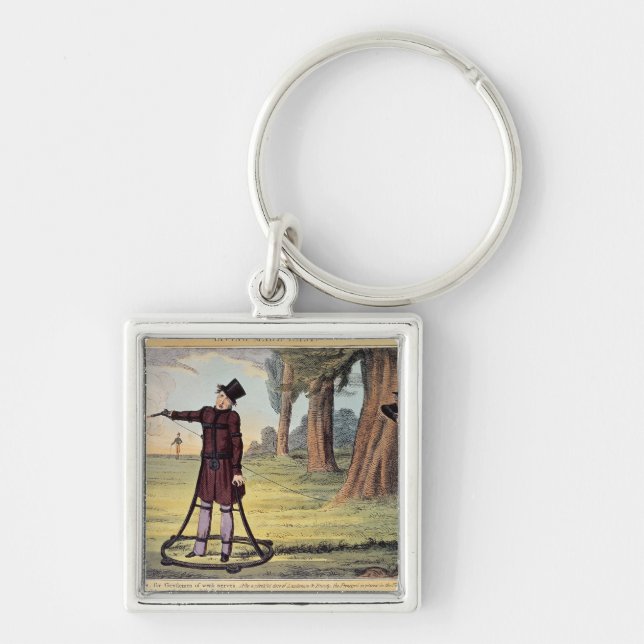 Living Made Easy; duelling apparatus Keychain (Front)