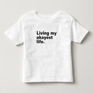 Living my okayest life. funny basic text design toddler t-shirt