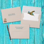 Living Seas Sand Tan Events Decorated Envelope<br><div class="desc">Sand tan A7 size envelope with sea theme design.  Seashells and coral decorate the lower left corner on the front.  A sea turtle image is under the flap.  Names and return address can be added to the flap in script and printed fonts in blue.</div>