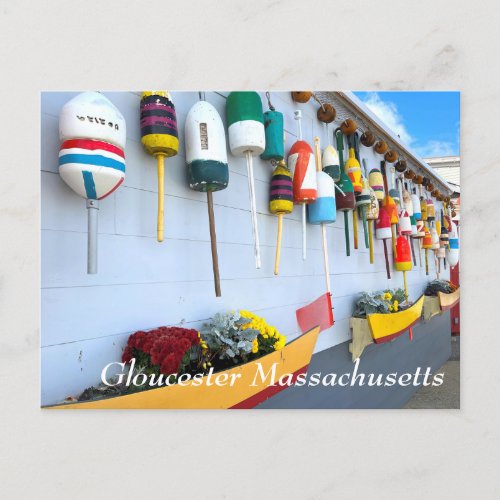 Lobster buoys on a building in Gloucester MA Postcard