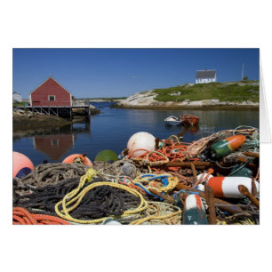 Lobster pots, buoys, and ropes on the dock at cards
