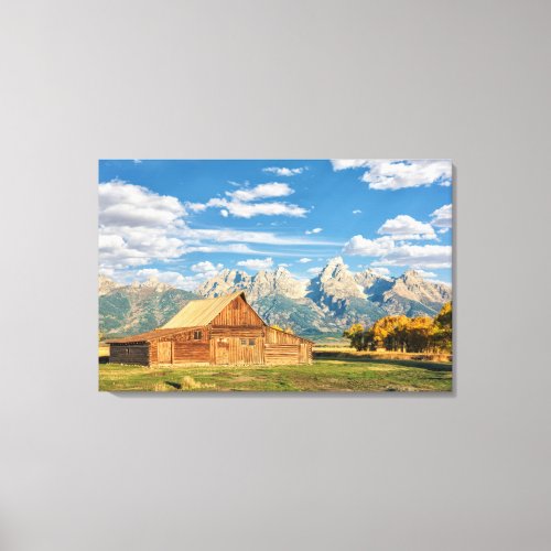 Log Cabin Near Mountain Range Canvas Print