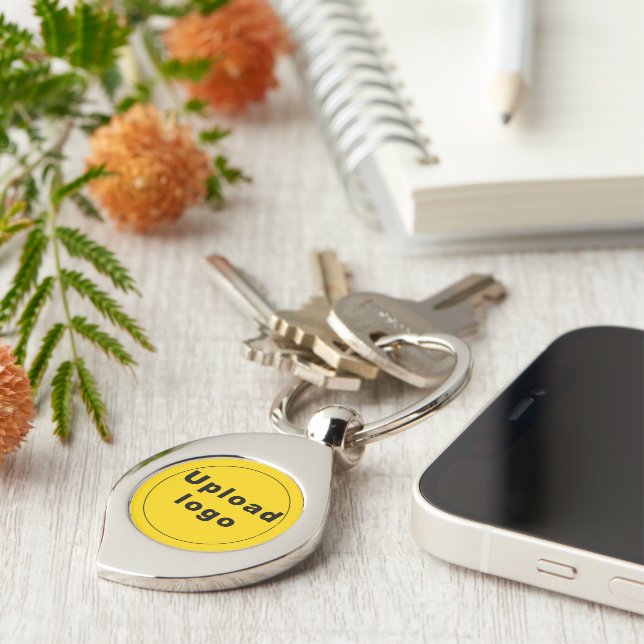 Logo With Yellow Background on Swirl Metal Keychain (Side)