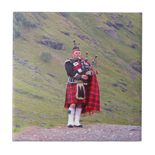 Lone Scottish bagpiper, Highlands, Scotland Ceramic Tile