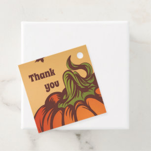 Lonely pumpkin one the field. Autumn leaves fall. Favor Tags