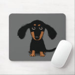 Long Haired Dachshund Puppy Cute Dog Cartoon Mouse Pad<br><div class="desc">Cute Longhaired Black and Tan Dachshund Cartoon Dog with Long Fuzzy Ears and Eyes Looking Up. An adorable Doxie puppy dog looking very sweet and maybe a little bit guilty. A fun mousepad to keep you company during long work hours at the computer. This original wiener dog mousepad makes a...</div>
