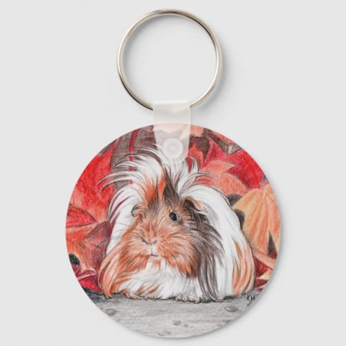 Long haired guinea pig in autumn keychain