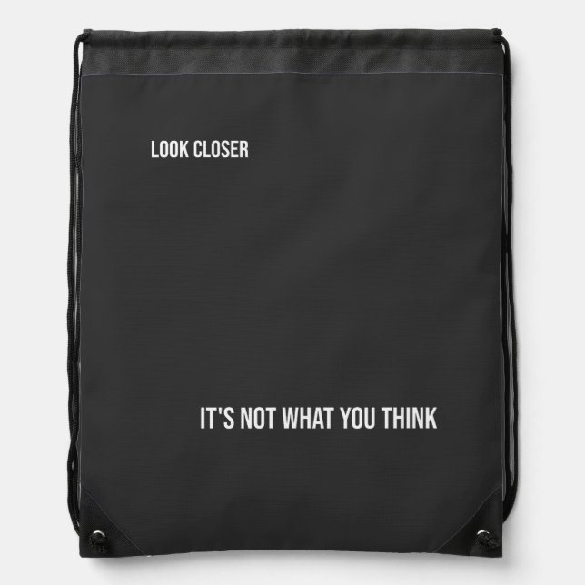 "LOOK CLOSER: IT'S NOT WHAT YOU THINK," bold Drawstring Bag (Front)