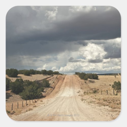 Looking down a  dirt country road in NM with Square Sticker