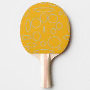 Loops on Orange Geometric Ping Pong Paddle