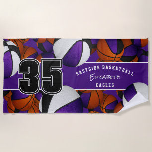 Lots of basketballs purple black team colors beach towel