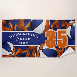 Lots of basketballs with blue orange team colors beach towel