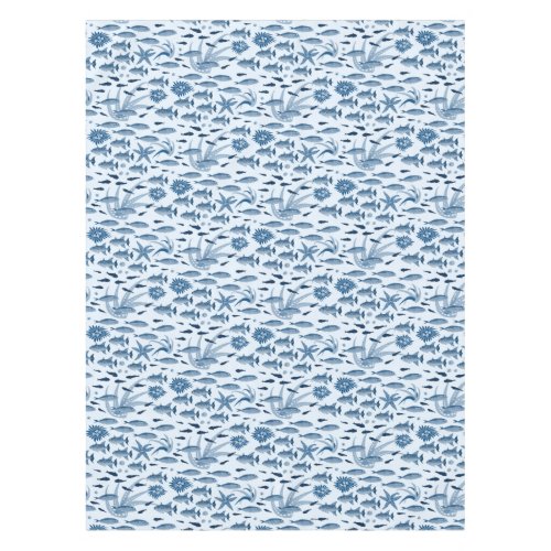 Lots of fish in blue tablecloth