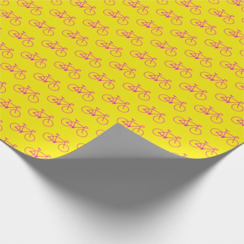 Lots of Magenta Bicycle Shapes on Yellow Wrapping Paper