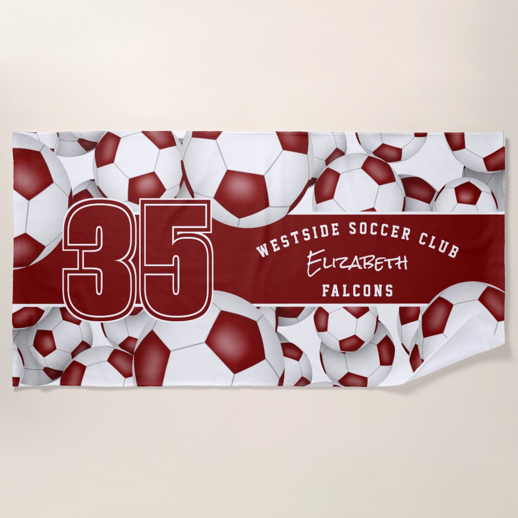 Lots of soccer balls custom team name maroon beach towel