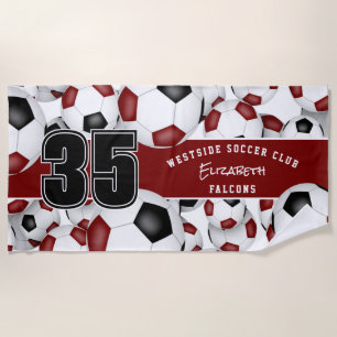 Lots of soccer balls maroon black team colors beach towel