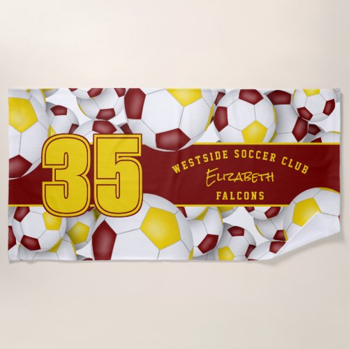 maroon gold soccer balls pattern beach towel